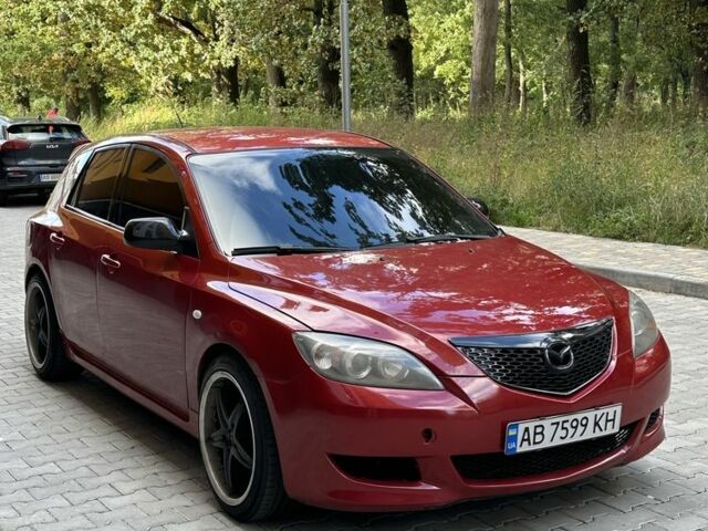 Красный Мазда 3, объемом двигателя 2 л и пробегом 210 тыс. км за 3500 $, фото 1 на Automoto.ua