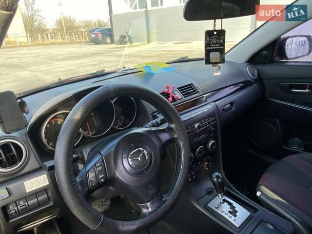 Червоний Мазда 3, об'ємом двигуна 1.6 л та пробігом 165 тис. км за 4850 $, фото 8 на Automoto.ua