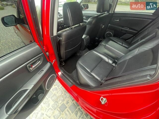 Красный Мазда 3, объемом двигателя 2 л и пробегом 270 тыс. км за 4999 $, фото 5 на Automoto.ua