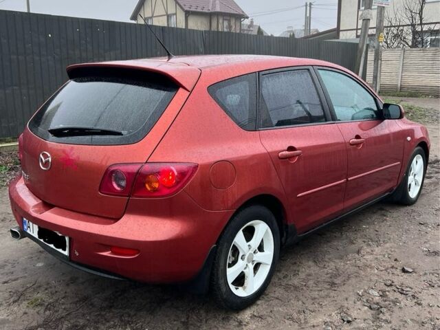 Червоний Мазда 3, об'ємом двигуна 1.6 л та пробігом 205 тис. км за 1999 $, фото 6 на Automoto.ua
