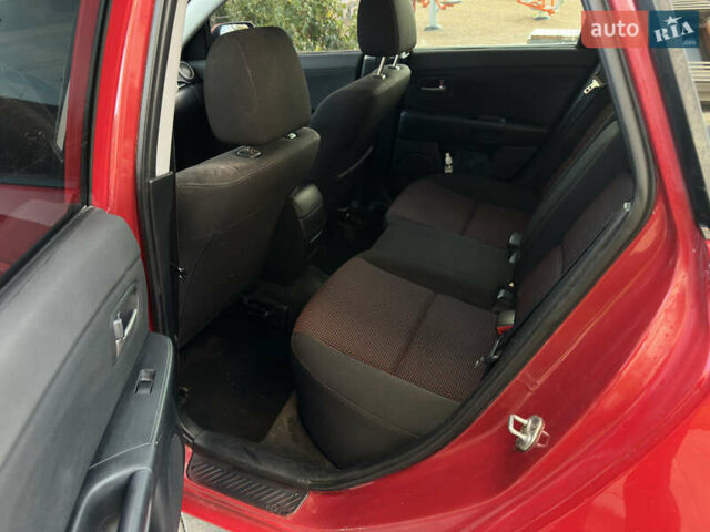 Мазда 3 2004 в Киеве на Automoto.ua Красный Мазда 3, объемом двигателя 1.6 л и пробегом 212 тыс. км за 4400 $, фото 12 на Automoto.ua