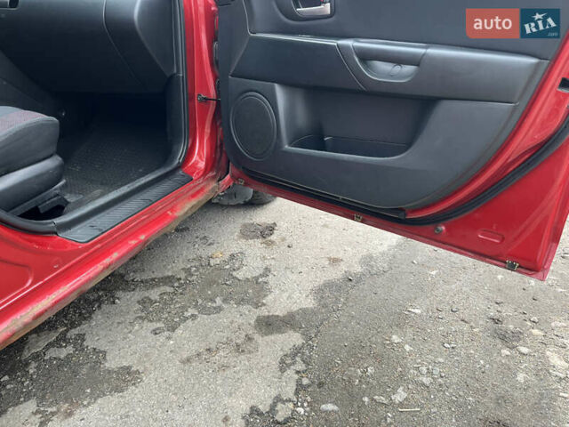 Червоний Мазда 3, об'ємом двигуна 1.6 л та пробігом 289 тис. км за 2700 $, фото 8 на Automoto.ua