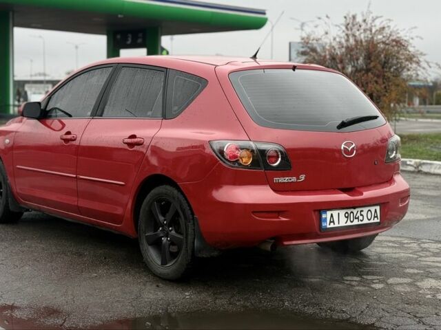 Красный Мазда 3, объемом двигателя 1.6 л и пробегом 249 тыс. км за 5699 $, фото 6 на Automoto.ua