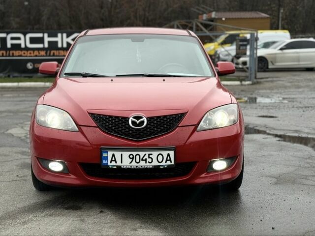 Красный Мазда 3, объемом двигателя 1.6 л и пробегом 249 тыс. км за 5699 $, фото 1 на Automoto.ua