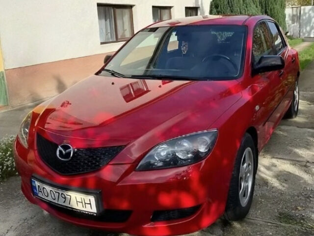 Червоний Мазда 3, об'ємом двигуна 1.35 л та пробігом 195 тис. км за 5100 $, фото 1 на Automoto.ua