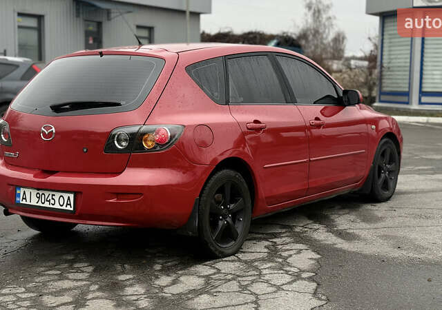 Красный Мазда 3, объемом двигателя 1.6 л и пробегом 249 тыс. км за 5699 $, фото 4 на Automoto.ua