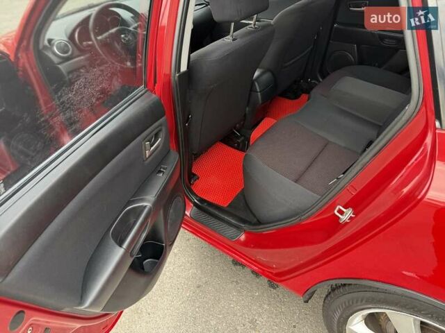 Мазда 3 2005 в Харькове на Automoto.ua Красный Мазда 3, объемом двигателя 1.6 л и пробегом 172 тыс. км за 5500 $, фото 13 на Automoto.ua
