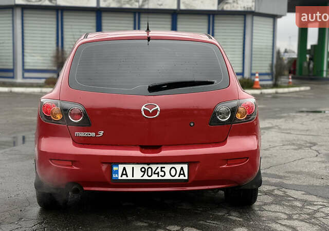 Красный Мазда 3, объемом двигателя 1.6 л и пробегом 249 тыс. км за 5699 $, фото 5 на Automoto.ua