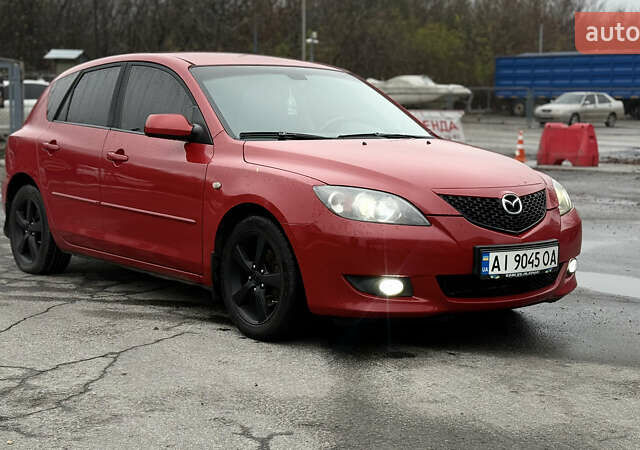 Красный Мазда 3, объемом двигателя 1.6 л и пробегом 249 тыс. км за 5699 $, фото 2 на Automoto.ua