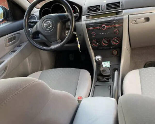 Мазда 3 2005 в Береговом на Automoto.ua Красный Мазда 3, объемом двигателя 1.35 л и пробегом 195 тыс. км за 5100 $, фото 12 на Automoto.ua