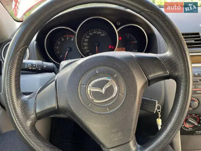 Мазда 3 2005 в Береговом на Automoto.ua Красный Мазда 3, объемом двигателя 1.35 л и пробегом 195 тыс. км за 5100 $, фото 6 на Automoto.ua