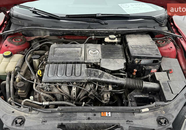Красный Мазда 3, объемом двигателя 1.6 л и пробегом 249 тыс. км за 5699 $, фото 14 на Automoto.ua