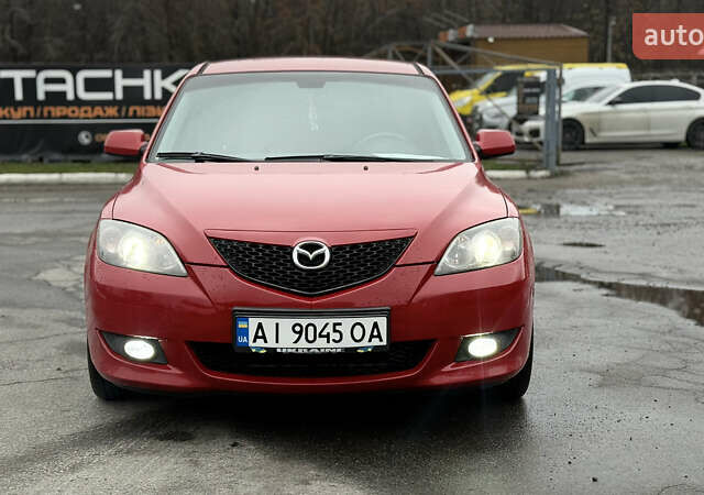 Красный Мазда 3, объемом двигателя 1.6 л и пробегом 249 тыс. км за 5699 $, фото 1 на Automoto.ua