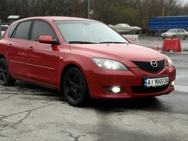 Красный Мазда 3, объемом двигателя 1.6 л и пробегом 249 тыс. км за 5699 $, фото 2 на Automoto.ua