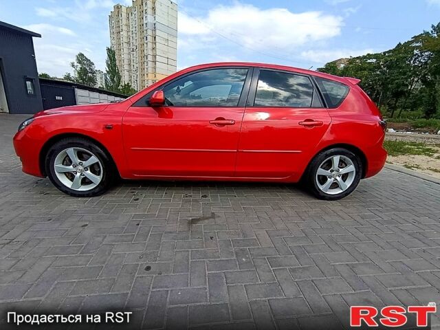 Красный Мазда 3, объемом двигателя 2 л и пробегом 202 тыс. км за 3650 $, фото 6 на Automoto.ua