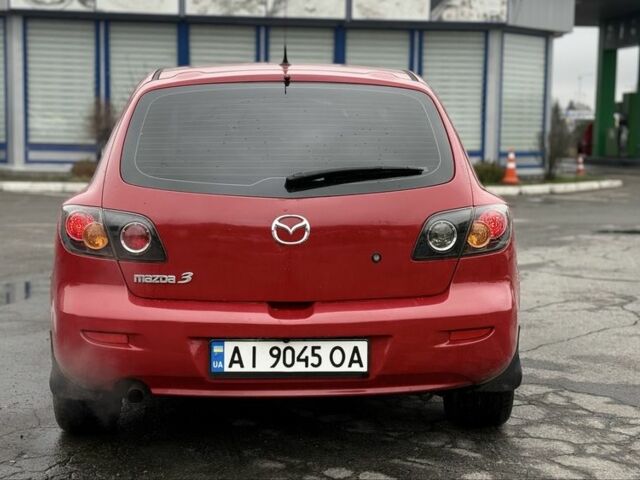 Красный Мазда 3, объемом двигателя 1.6 л и пробегом 249 тыс. км за 5699 $, фото 5 на Automoto.ua