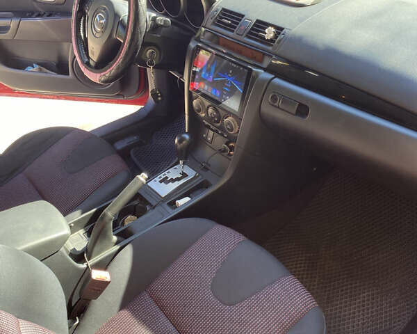 Красный Мазда 3, объемом двигателя 1.6 л и пробегом 248 тыс. км за 4700 $, фото 4 на Automoto.ua