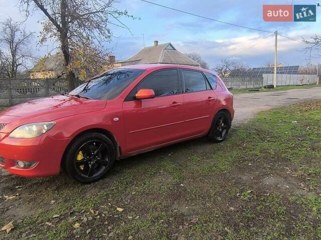 Красный Мазда 3, объемом двигателя 2 л и пробегом 256 тыс. км за 4800 $, фото 9 на Automoto.ua
