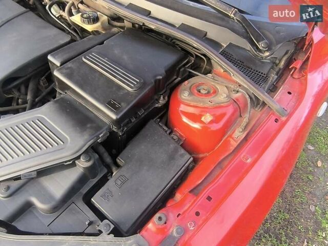 Красный Мазда 3, объемом двигателя 2 л и пробегом 256 тыс. км за 4800 $, фото 10 на Automoto.ua