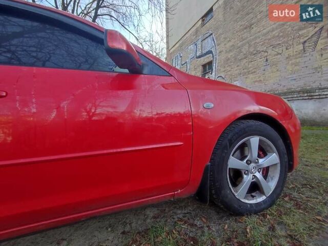 Червоний Мазда 3, об'ємом двигуна 1.6 л та пробігом 193 тис. км за 3990 $, фото 1 на Automoto.ua