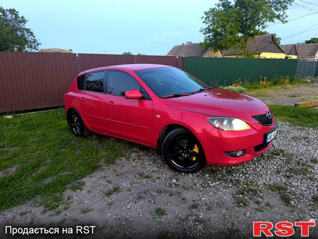 Красный Мазда 3, объемом двигателя 2 л и пробегом 255 тыс. км за 4800 $, фото 1 на Automoto.ua