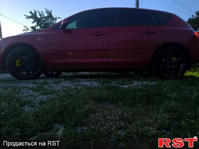 Красный Мазда 3, объемом двигателя 2 л и пробегом 255 тыс. км за 4800 $, фото 5 на Automoto.ua