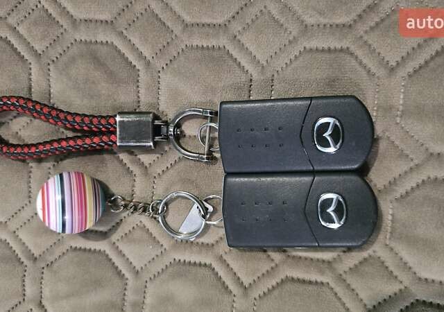 Красный Мазда 3, объемом двигателя 1.6 л и пробегом 205 тыс. км за 4938 $, фото 52 на Automoto.ua