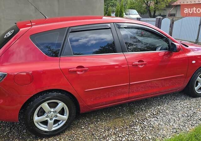 Красный Мазда 3, объемом двигателя 1.6 л и пробегом 205 тыс. км за 4938 $, фото 44 на Automoto.ua