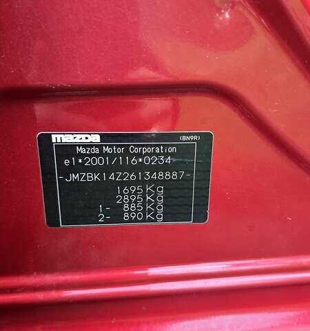 Красный Мазда 3, объемом двигателя 1.6 л и пробегом 205 тыс. км за 4938 $, фото 24 на Automoto.ua