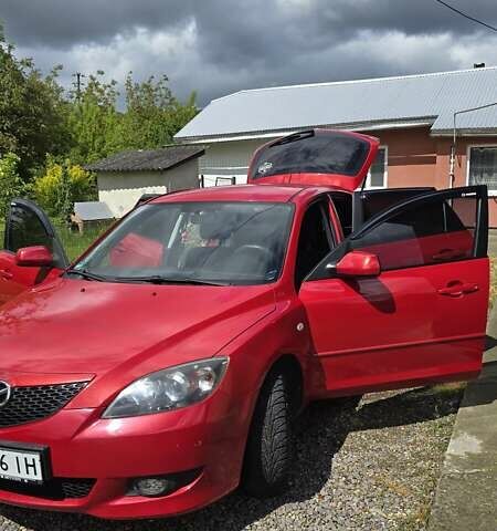 Красный Мазда 3, объемом двигателя 1.6 л и пробегом 205 тыс. км за 4938 $, фото 2 на Automoto.ua