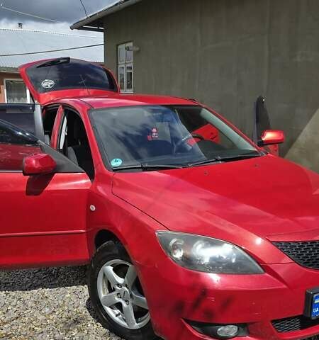 Красный Мазда 3, объемом двигателя 1.6 л и пробегом 205 тыс. км за 4938 $, фото 9 на Automoto.ua