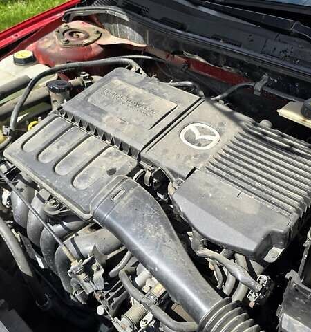 Красный Мазда 3, объемом двигателя 1.6 л и пробегом 205 тыс. км за 4938 $, фото 13 на Automoto.ua