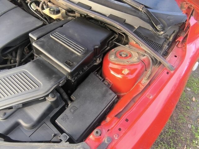 Червоний Мазда 3, об'ємом двигуна 2 л та пробігом 255 тис. км за 4800 $, фото 7 на Automoto.ua