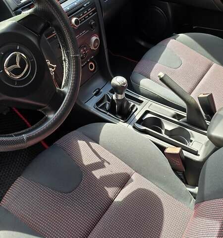 Красный Мазда 3, объемом двигателя 1.6 л и пробегом 205 тыс. км за 4938 $, фото 33 на Automoto.ua