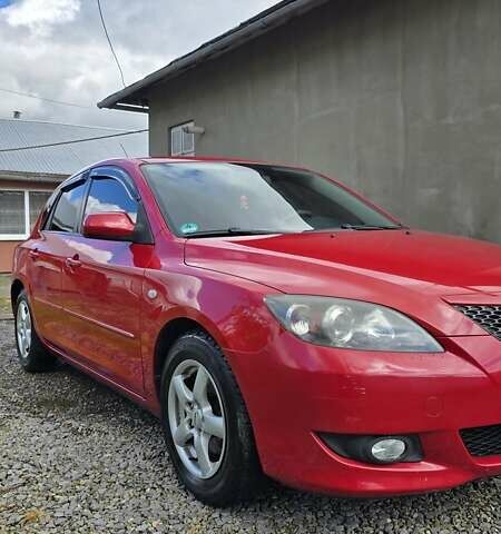 Красный Мазда 3, объемом двигателя 1.6 л и пробегом 205 тыс. км за 4938 $, фото 3 на Automoto.ua