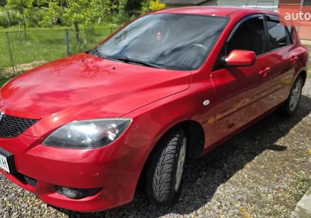 Красный Мазда 3, объемом двигателя 1.6 л и пробегом 205 тыс. км за 4938 $, фото 1 на Automoto.ua