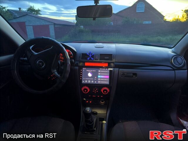 Красный Мазда 3, объемом двигателя 2 л и пробегом 255 тыс. км за 4800 $, фото 7 на Automoto.ua