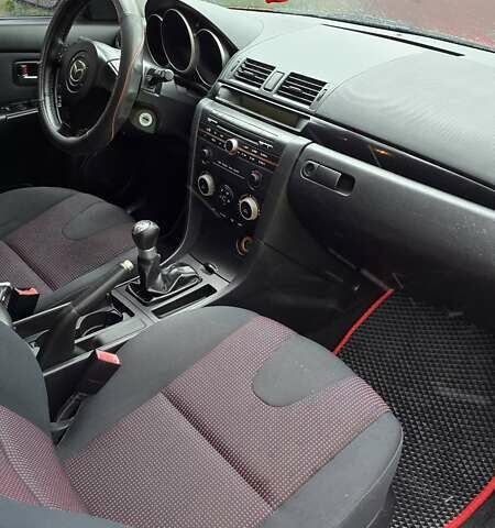 Красный Мазда 3, объемом двигателя 1.6 л и пробегом 205 тыс. км за 4938 $, фото 57 на Automoto.ua