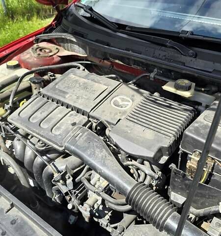 Красный Мазда 3, объемом двигателя 1.6 л и пробегом 205 тыс. км за 4938 $, фото 14 на Automoto.ua