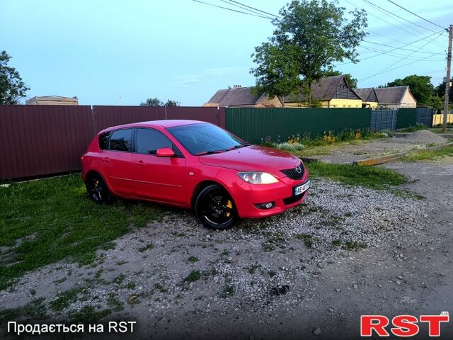 Красный Мазда 3, объемом двигателя 2 л и пробегом 255 тыс. км за 4800 $, фото 3 на Automoto.ua