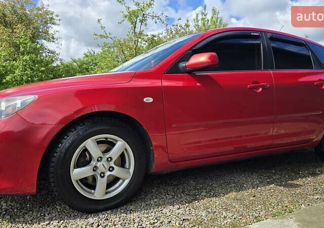 Красный Мазда 3, объемом двигателя 1.6 л и пробегом 205 тыс. км за 4938 $, фото 34 на Automoto.ua