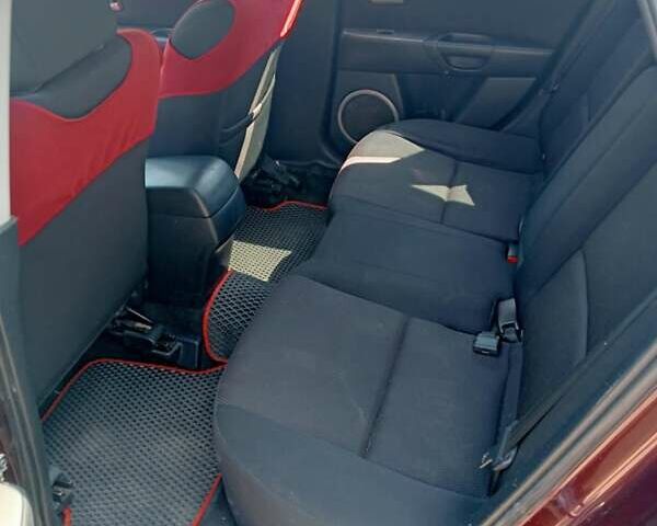 Червоний Мазда 3, об'ємом двигуна 1.6 л та пробігом 250 тис. км за 4200 $, фото 9 на Automoto.ua