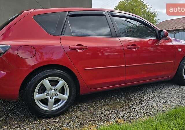 Красный Мазда 3, объемом двигателя 1.6 л и пробегом 205 тыс. км за 4938 $, фото 43 на Automoto.ua