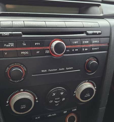 Красный Мазда 3, объемом двигателя 1.6 л и пробегом 205 тыс. км за 4938 $, фото 49 на Automoto.ua