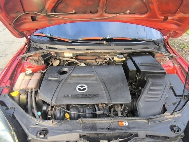 Червоний Мазда 3, об'ємом двигуна 2 л та пробігом 255 тис. км за 4800 $, фото 5 на Automoto.ua