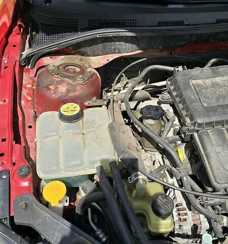 Красный Мазда 3, объемом двигателя 1.6 л и пробегом 205 тыс. км за 4938 $, фото 11 на Automoto.ua