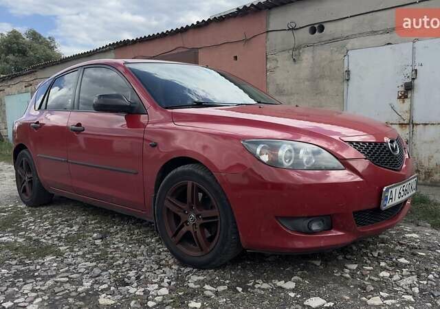 Красный Мазда 3, объемом двигателя 1.6 л и пробегом 216 тыс. км за 4100 $, фото 1 на Automoto.ua