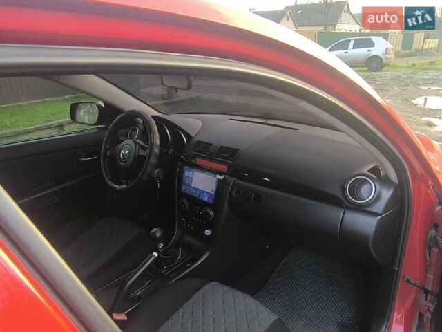 Красный Мазда 3, объемом двигателя 2 л и пробегом 256 тыс. км за 4800 $, фото 12 на Automoto.ua