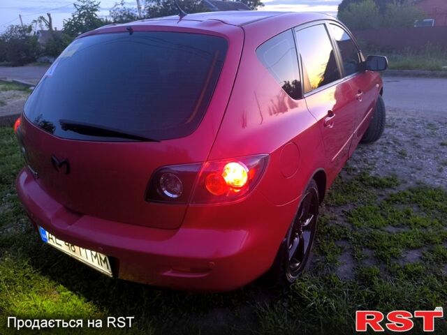 Красный Мазда 3, объемом двигателя 2 л и пробегом 255 тыс. км за 4800 $, фото 2 на Automoto.ua