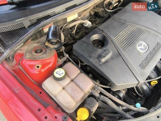 Красный Мазда 3, объемом двигателя 2 л и пробегом 256 тыс. км за 4800 $, фото 11 на Automoto.ua